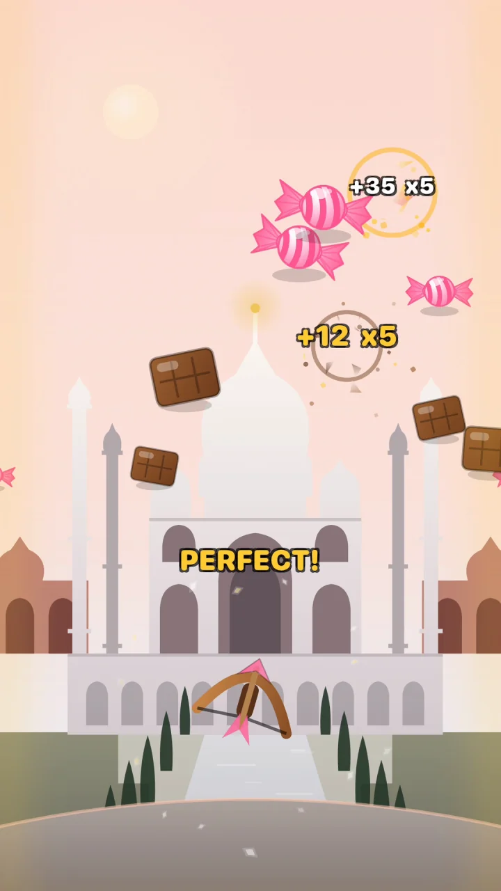 Captura de SnackShot: un arco dispara a snacks que vuelan ante el Taj Mahal, con un combo PERFECT!